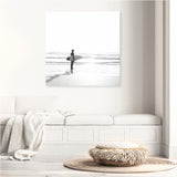 Shop Surfer On The Sand (Square) Canvas Art Print-Black, Boho, Coastal, Grey, People, Photography Canvas Prints, Square, Tropical, View All, White-framed wall decor artwork