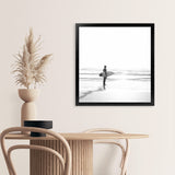 Shop Surfer On The Sand (Square) Photo Art Print-Black, Boho, Coastal, Grey, People, Photography, Square, Tropical, View All, White-framed poster wall decor artwork