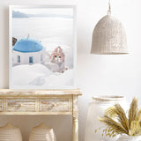 Shop Santorini Panorama I Photo Art Print-Blue, Coastal, Greece, Photography, Portrait, View All, White-framed poster wall decor artwork