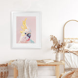 Shop Charlie The Cockatoo (Pink) Art Print-Animals, Baby Nursery, Birds, Pink, Portrait, Tropical, View All, Yellow-framed painted poster wall decor artwork