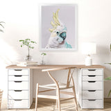 Shop Charlie The Cockatoo (Ice) Art Print-Animals, Baby Nursery, Birds, Pink, Portrait, Tropical, View All, White, Yellow-framed painted poster wall decor artwork