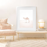 Shop Lone Camel III Photo Art Print-Animals, Baby Nursery, Boho, Moroccan Days, Photography, Pink, Portrait, View All, White-framed poster wall decor artwork