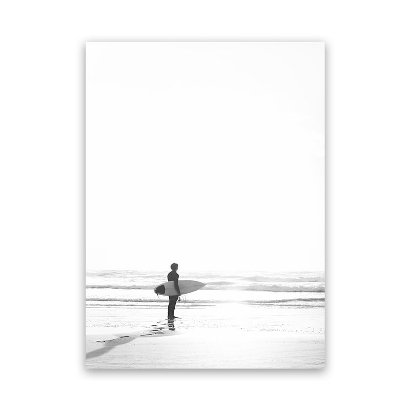 Shop Surfer On The Sand Photo Canvas Art Print-Black, Boho, Coastal, Grey, People, Photography, Photography Canvas Prints, Portrait, View All, White-framed wall decor artwork