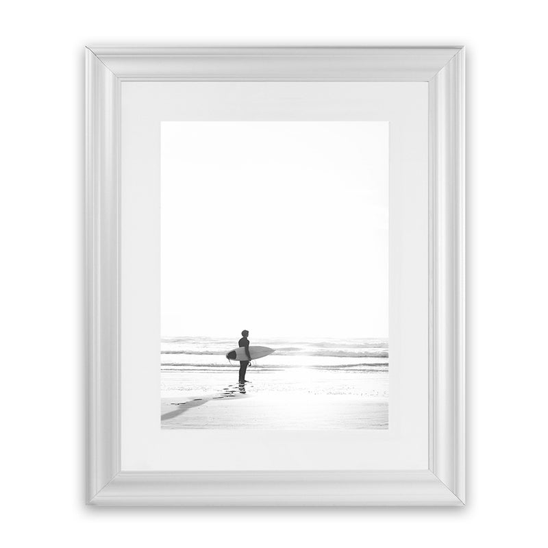 Shop Surfer On The Sand Photo Photo Art Print-Black, Boho, Coastal, Grey, People, Photography, Portrait, Scandinavian, View All, White-framed poster wall decor artwork