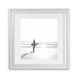 Shop Surfer On The Sand (Square) Photo Art Print-Black, Boho, Coastal, Grey, People, Photography, Square, Tropical, View All, White-framed poster wall decor artwork