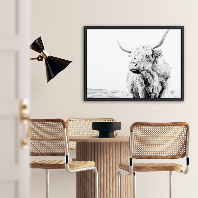 Shop Lone Highland Cow B&W Photo Canvas Art Print-Animals, Black, Horizontal, Landscape, Photography, Photography Canvas Prints, Rectangle, View All, White-framed wall decor artwork