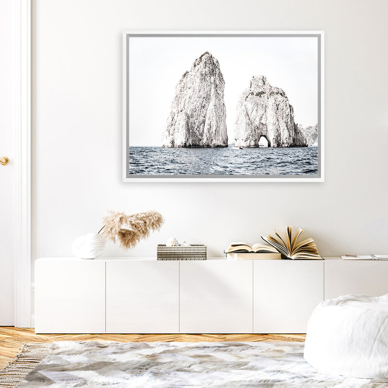 Shop Capri Rocks Photo Canvas Art Print-Blue, Coastal, Landscape, Neutrals, Photography, Photography Canvas Prints, View All, White-framed wall decor artwork